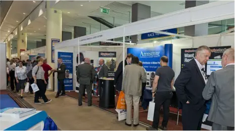 Commercial laundry exhibitors at a trade show